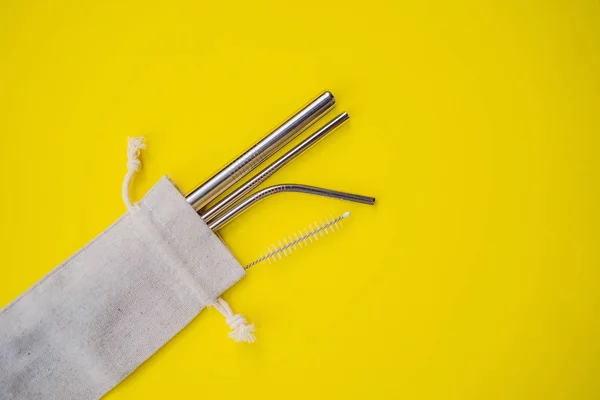Steel drinking straws on a yellow background. Zero waste concept — Stock Photo, Image