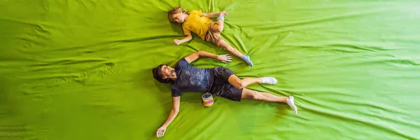 Dad and son at the climbing wall. Family sport, healthy lifestyle, happy family BANNER, LONG FORMAT