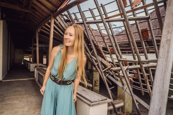 Woman tourist in abandoned and mysterious hotel in Bedugul. Indonesia, Bali Island. Bali Travel Concept — Stock Photo, Image