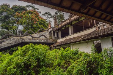 Abandoned and mysterious hotel in Bedugul. Indonesia, Bali Island clipart