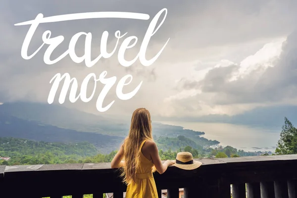 TRAVEL MORE concept Woman traveler looking at Batur volcano. Indonesia — Stock Photo, Image