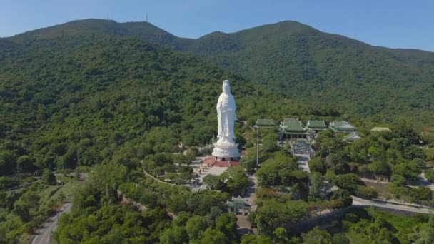 Aerial shot of the famous travel destination Son Tra Linh Ung Pagoda also known as Ledy Buddha in the city of Da Nang in central Vietnam. Travel to Vietnam concept. The City of Da Nang is the new — Stock Video