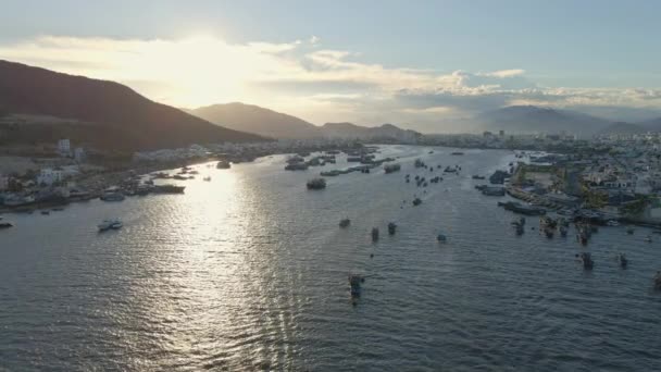 Aerial slow motion shot of touristic boats in a busy Nha Trang harbor. Travel to Vietnam concept. — Stock Video