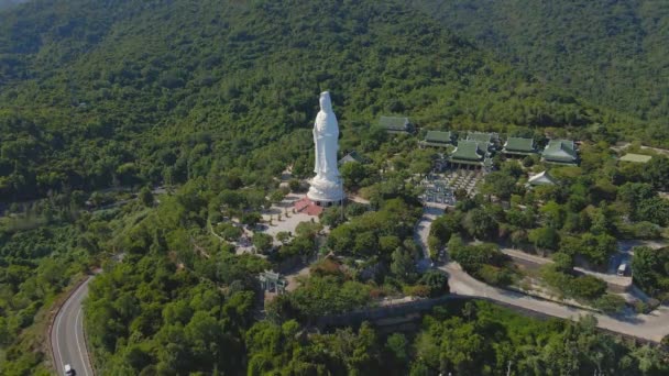 Aerial shot of the famous travel destination Son Tra Linh Ung Pagoda also known as Ledy Buddha in the city of Da Nang in central Vietnam. Travel to Vietnam concept. The City of Da Nang is the new — Stock Video