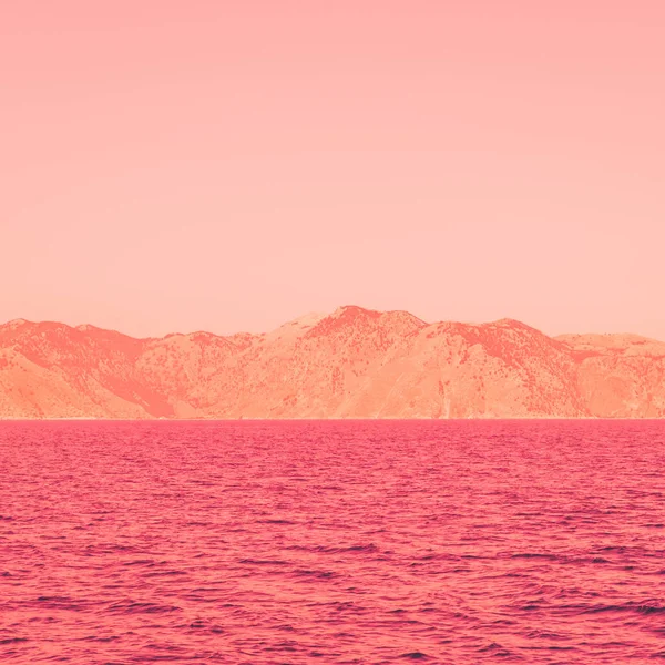 mountain landscape and sea. bright neon colors. minimal and surreal. summer vacation.