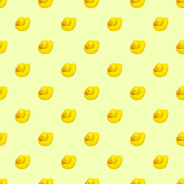 Seamless pattern of yellow rubber ducks