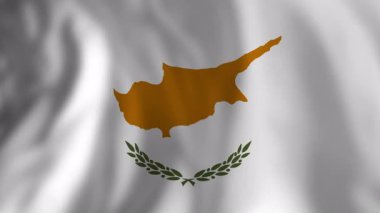 Kiril bayrağı rüzgarda gururla dalgalanır, beyaz arka planda belirgin turuncu haritasını ve zeytin dallarını gösterir.