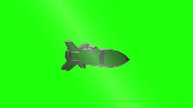 Metalik füze simgesi düzgün bir şekilde dönüyor, canlı yeşil ekran arka planına karşı dijital kompozitasyon ve hareket grafikleri kullanımı için parlak bir tasarım ortaya koyuyor
