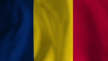 Ulusal gurur ve kültür mirasını sembolize eden canlı mavi, sarı ve kırmızı renkte ışığa karşı nazikçe dalgalanan Romen ulusal bayrağı