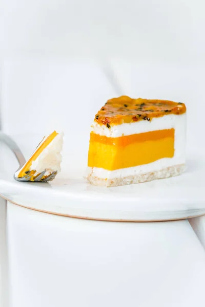 Piece Mango Coconut Passion Fruit Cake White Wooden Table Minimalism — Stock Photo, Image