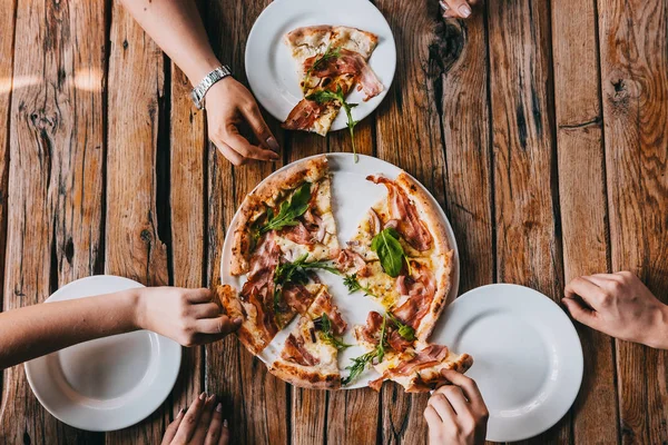 Hands Grabbing Pizza Carbonara Rustic Wooden Table Food Photography Concept Stock Photo