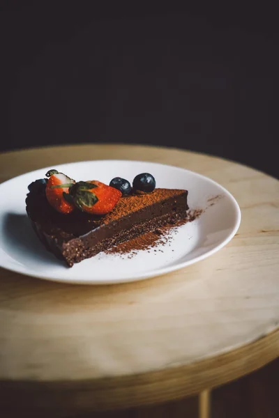 Vegan raw chocolate flourless piece of cake — Stock Photo, Image