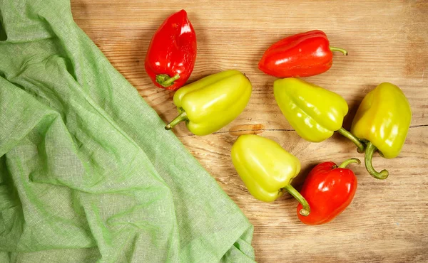 Bulgarian pepper and tomatoes are on the table