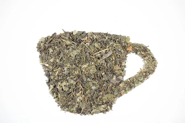 tea dry on a white background in the form of a mug