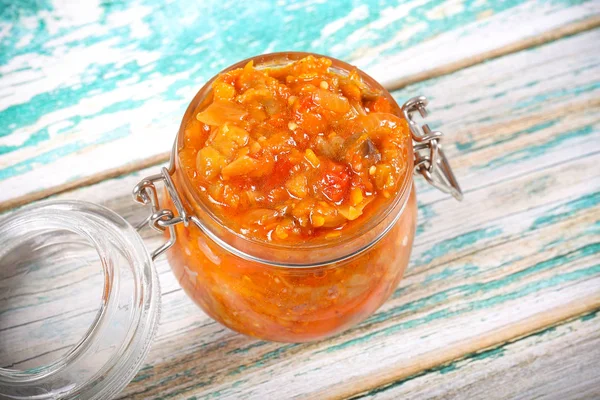 Eggplant caviar ready in a can on the table