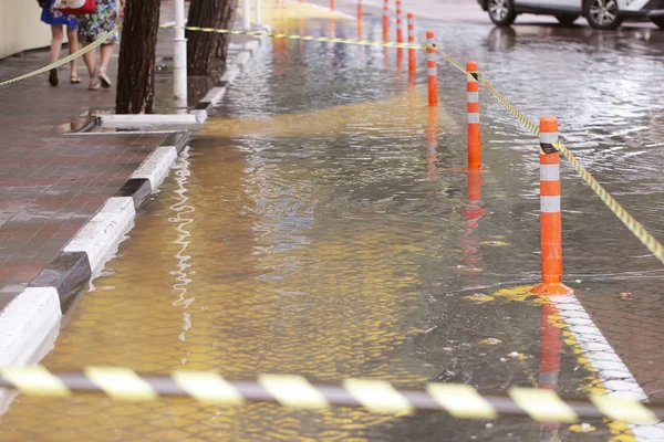 flood and puddles after rain in the streets