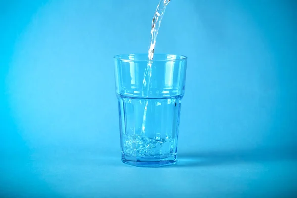 the water is clean in a glass on the table