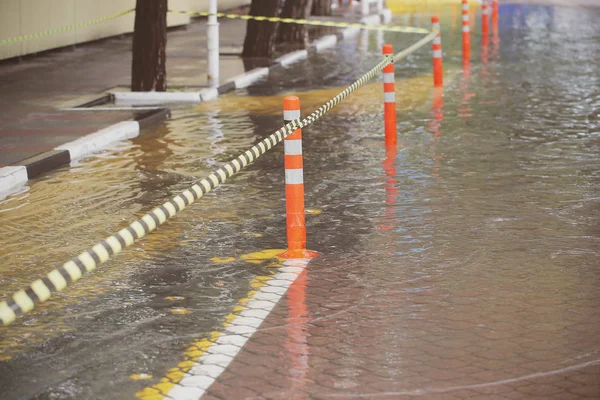 flood and puddles after rain in the streets