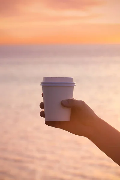 paper Cup with coffee in nature