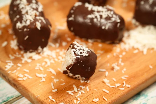 handmade chocolate coconut candies lie on the table