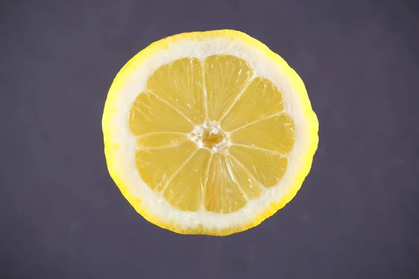 lemon cut juicy on bright background