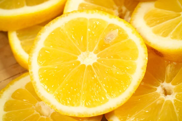 lemon cut juicy on bright background