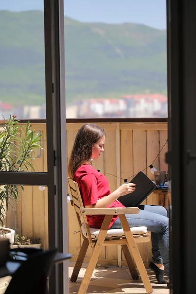 girl at home on self-isolation resting and reading