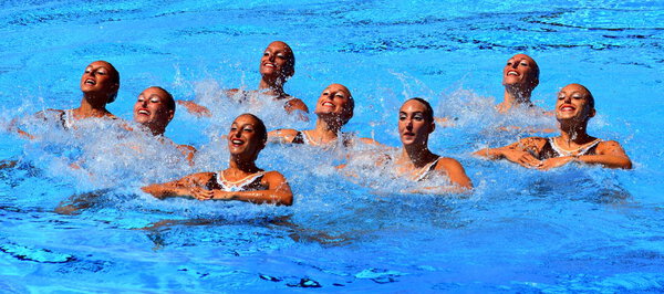 Budapest, Hungary - Jul 18, 2017. Synchronized swimming team Italy  performing a synchronized routine of elaborate moves in the Final of Team Technical. FINA Synchro Swimming World Championship.