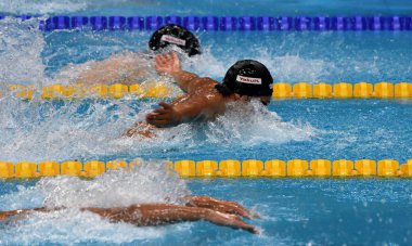 Budapeşte, Macaristan - 29 Temmuz 2017. Kazanan Dressel Caeleb Remel (ABD), erkekler 100m kelebek zafer töreni. Kısa Kulvar Yüzme Şampiyonası.