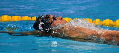 Budapeşte, Macaristan - 26 Temmuz 2017. Rekabetçi yüzücü Grevers Matt (ABD) karışık 4x100m Medley geçiş son. Duna arenada Fina yüzme Dünya Şampiyonası düzenlendi.