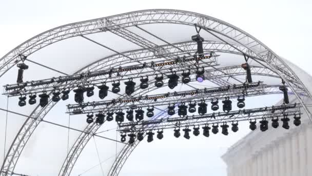 The roof of stage with lamps on open air in the city in cloudy day — Stock Video