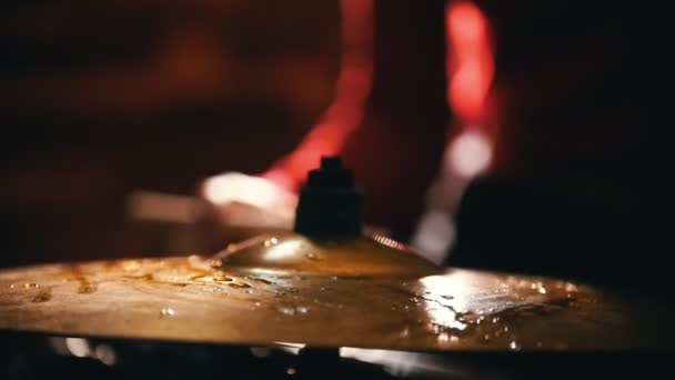 Repetition. Girl playing drums. Water on hi-hat close up — Stock Video