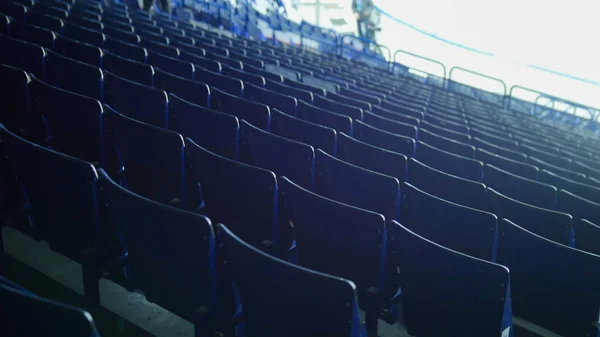 Preparing for a hockey match. Empty chairs