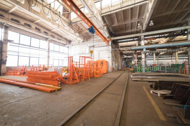 Endüstriyel kavramı. Turuncu endüstriyel vinç parçaları