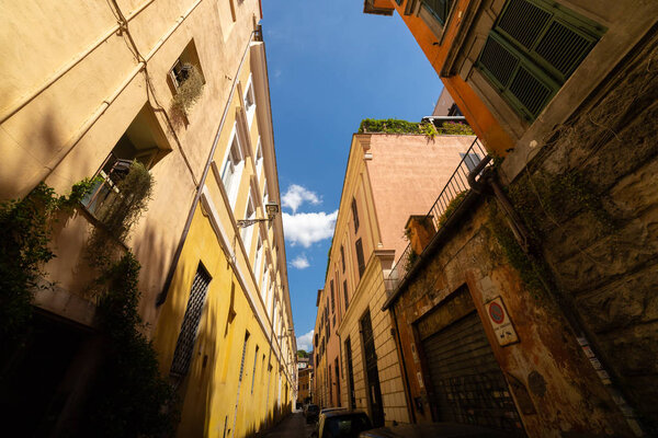 Italian streets. Old specific buildings under the sunlight. Mid shot
