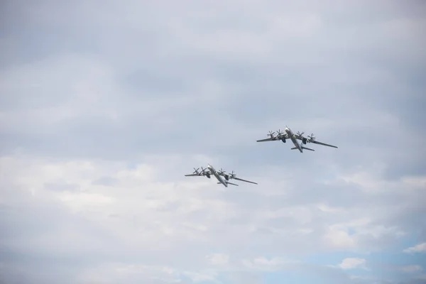 Two military long range bomber aircrafts flying in the sky — Stock Photo, Image