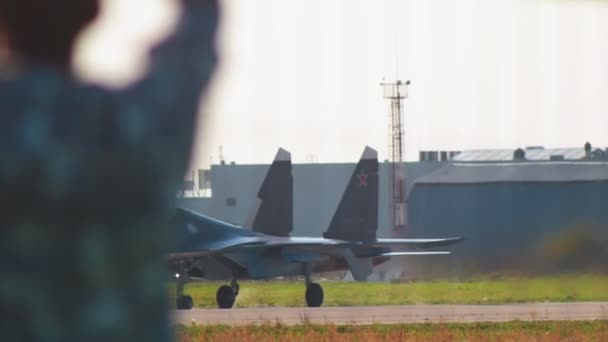 29 AUGUST 2019 MOSCOW, RUSSIA: reactive fighter plane is gaining speed on the runway — Stock Video