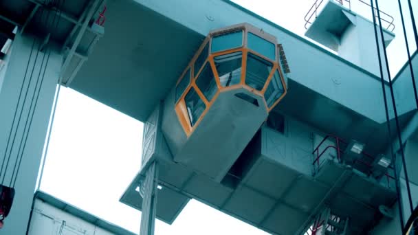 Industrial concept - a control cabin for cargo shipping machine — Stockvideo