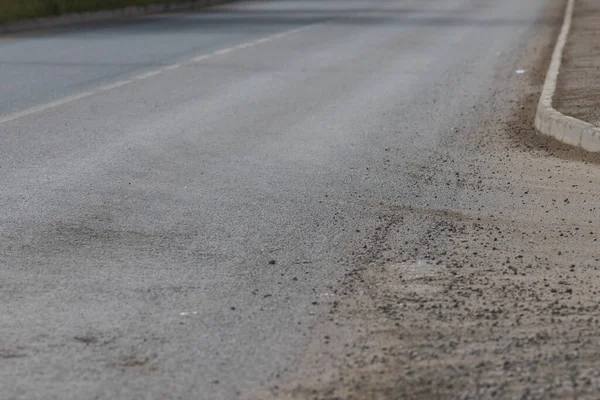 Asfalto cinza claro na nova estrada — Fotografia de Stock