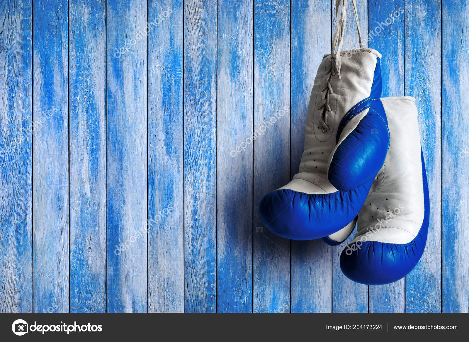 Blue Boxing Gloves Blue Wooden Background Stock Photo by ©VladVasilkov  204173224