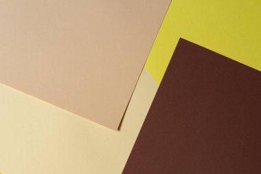 Renk kağıtları geometri kompozisyon arka plan kahverengi, bej ve sarı tonlar.