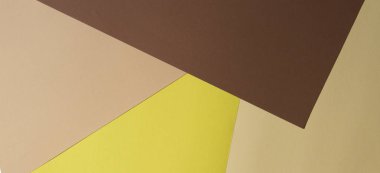 Renk kağıtları geometri kompozisyon arka plan kahverengi, bej ve sarı tonlar.