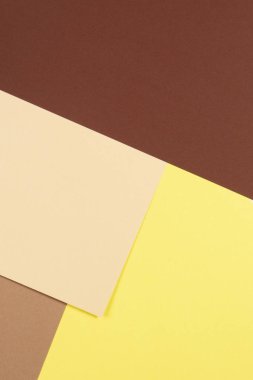 Renk kağıtları geometri kompozisyon arka plan kahverengi, bej ve sarı tonlar.