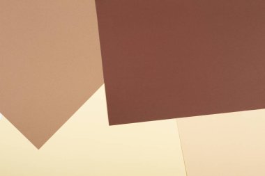 Renk kağıtları geometri kompozisyon arka plan kahverengi, bej ve sarı tonlar.