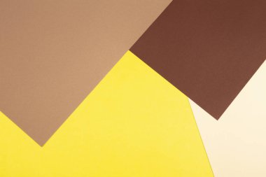 Renk kağıtları geometri kompozisyon arka plan kahverengi, bej ve sarı tonlar.