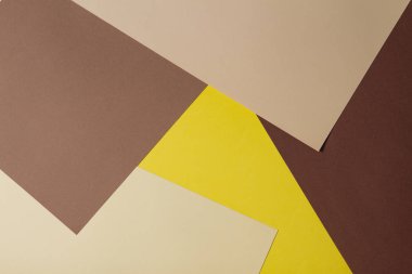 Renk kağıtları geometri kompozisyon arka plan kahverengi, bej ve sarı tonlar.