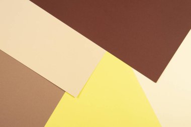 Renk kağıtları geometri kompozisyon arka plan kahverengi, bej ve sarı tonlar.