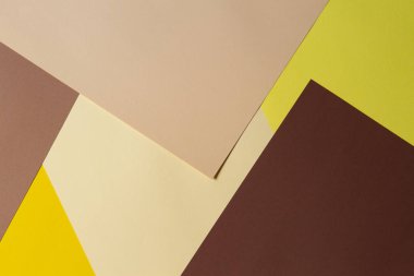 Renk kağıtları geometri kompozisyon arka plan kahverengi, bej ve sarı tonlar.