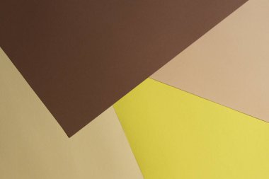 Renk kağıtları geometri kompozisyon arka plan kahverengi, bej ve sarı tonlar.