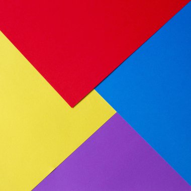 Renkli Kağıt arka plan kırmızı, mavi, mor ve yelloe sesleri ile